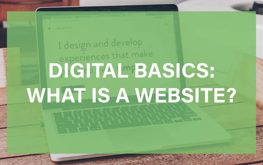 A laptop on a wooden surface with the text “DIGITAL BASICS: WHAT IS A WEBSITE?” displayed in bold white letters over a green transparent overlay.